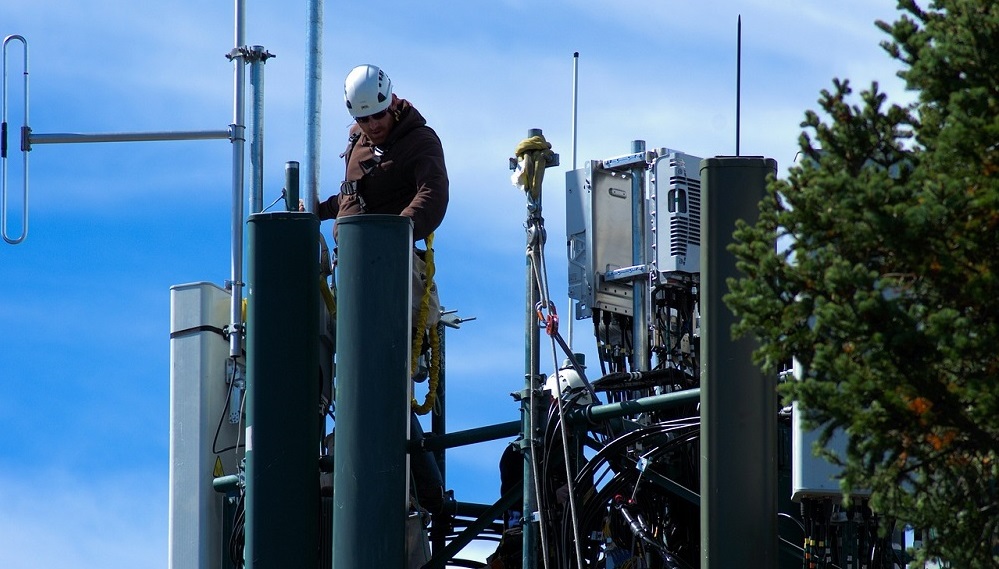 Engineers working on cell tower