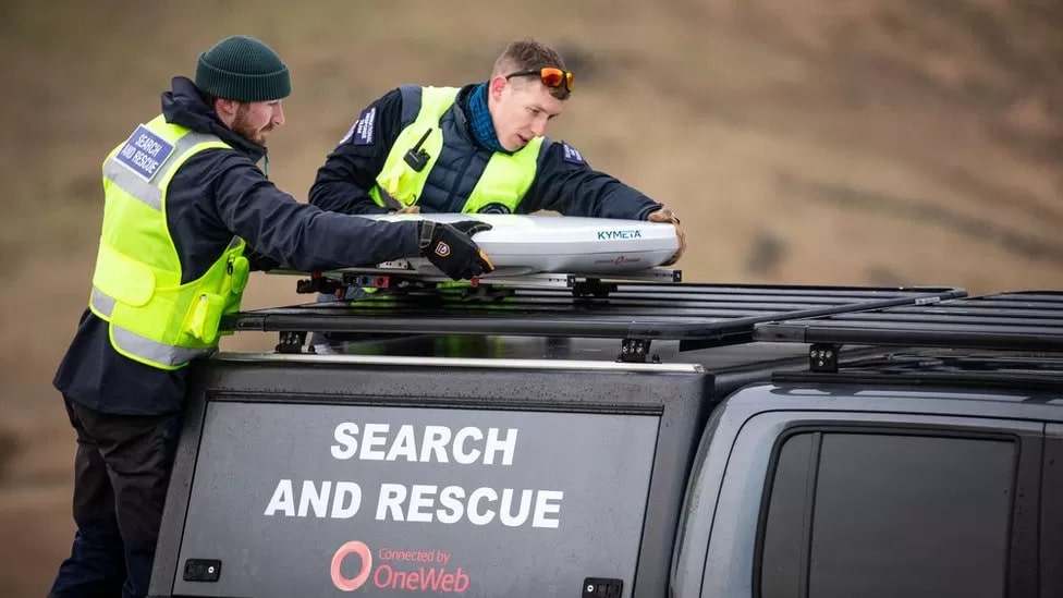 Search and rescue team fitting Kymeta LEO device to vehicle