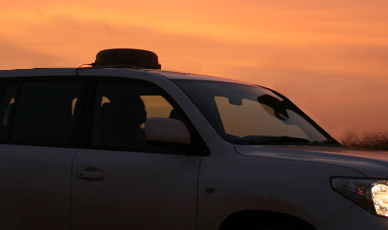 Hughes 9450 C11 on car roof