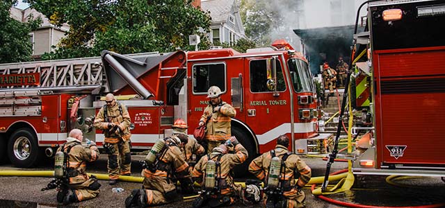 Fire fighters after extinguishing fire