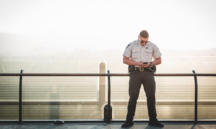 Policeman stood on bridge