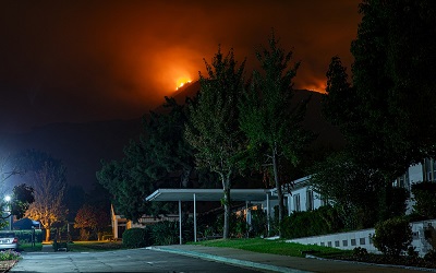 Wild Fire over mountain at Night Time