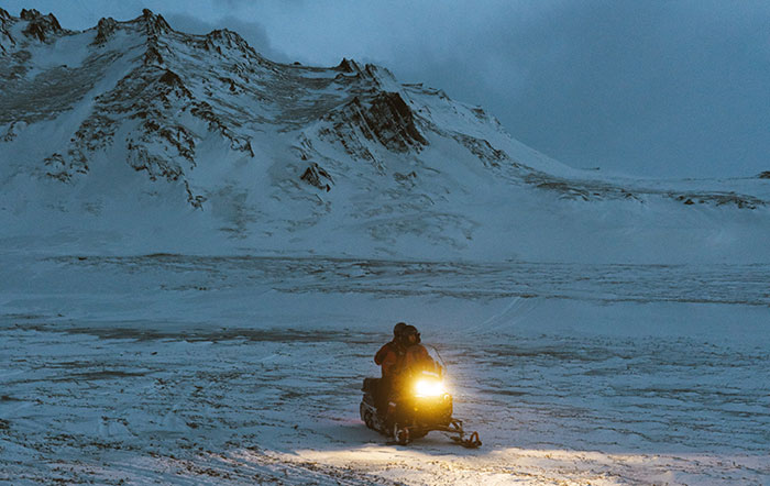 Snowmobile in the dark