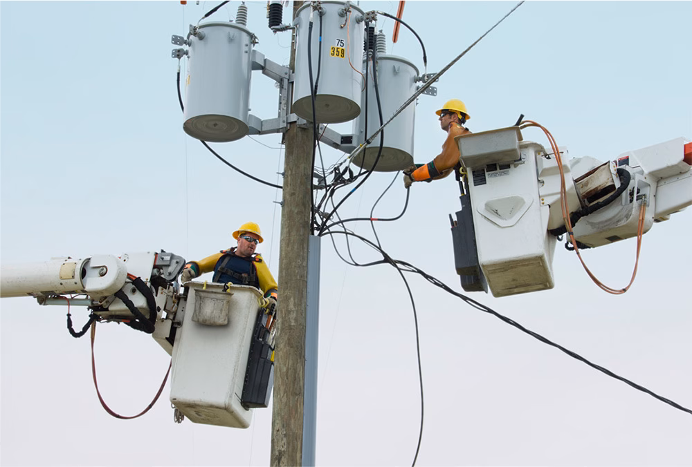 Hughes 9502 Terminal being installed on power line