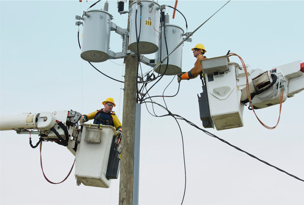 Hughes 9502 Terminal being installed on power line