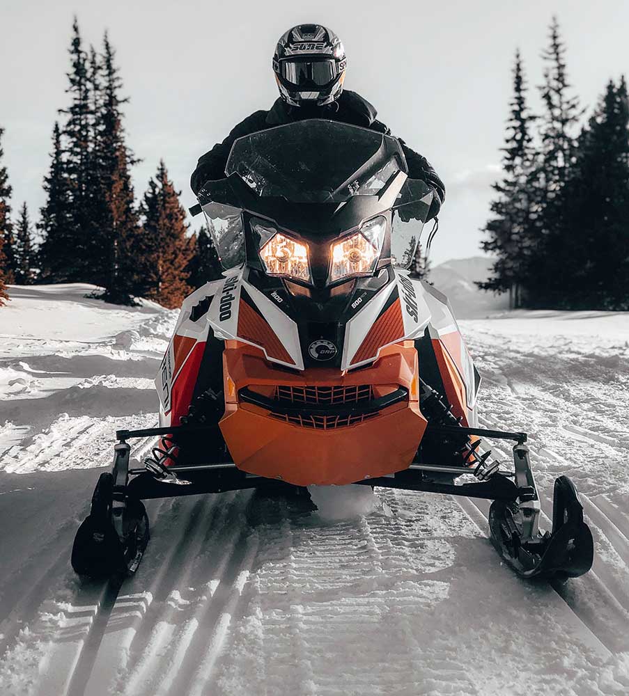 Snowmobile with driver